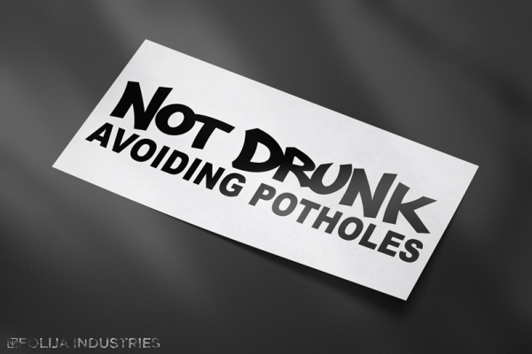 NOT DRUNK AVOIDING POTHOLES